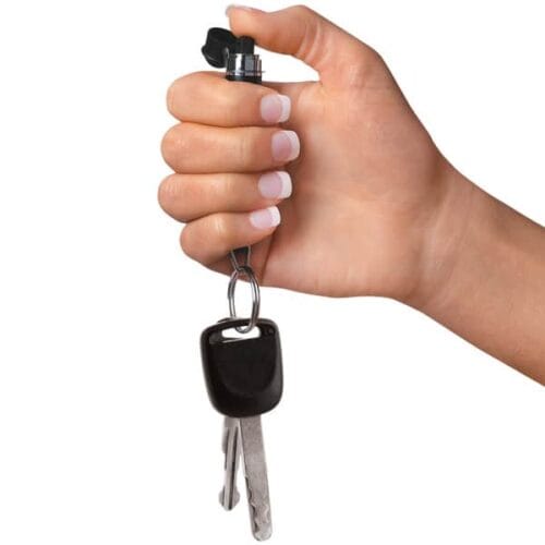 Black Mace Brand Pepper Spray Mini Model Keychain Open In Hand With Keys Attached