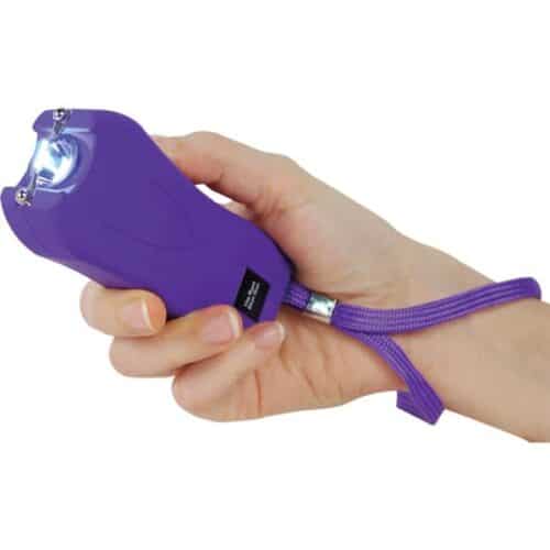 Purple Runt Rechargeable Stun Gun With Flashlight and Wrist Strap Disable Pin In Hand