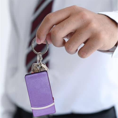Purple Fang Stun Gun Keychain Rechargeable In Hand
