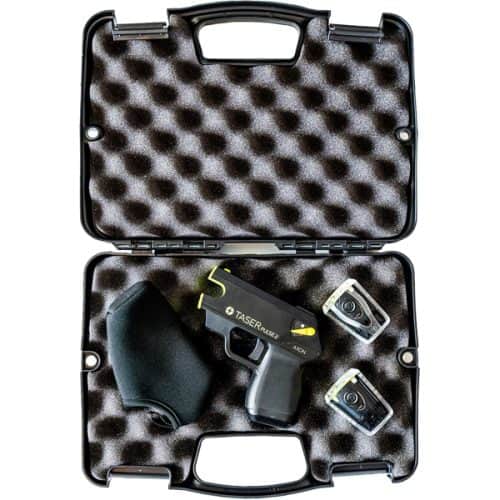 TASER Pulse self-defense device in protective case with accessories, compact and ready for personal security needs.