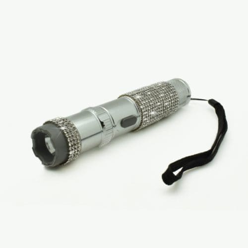 Silver rhinestone-studded flashlight with black wrist strap on a white background.