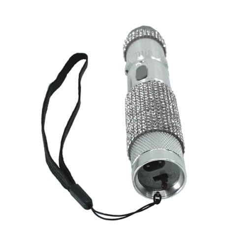 Sleek silver flashlight adorned with sparkling rhinestones, complete with a black wrist strap for easy carrying.