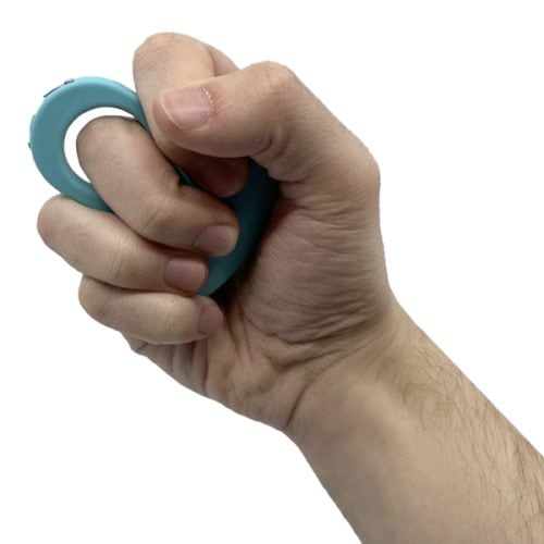 Hand squeezing a blue sting ring stun gun against a white background.