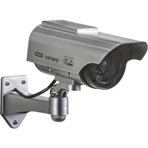 Surveillance camera mounted on wall bracket for security monitoring, featuring CCD technology and night vision capability.