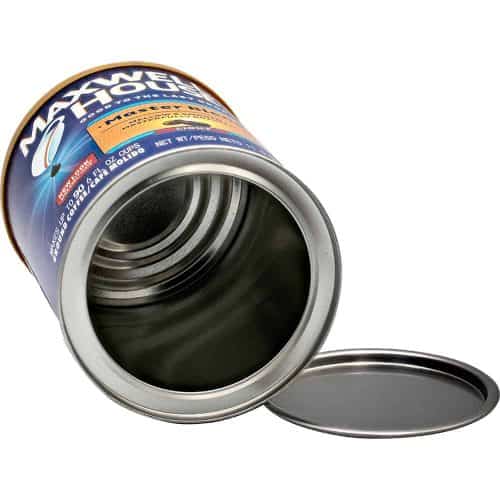 Empty Maxwell House coffee tin with lid, open and laying on its side, displaying interior.