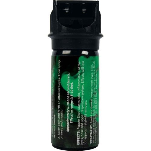 Pepper spray canister with green label detailing usage, effects, and treatment. Safety defense product for self-protection.