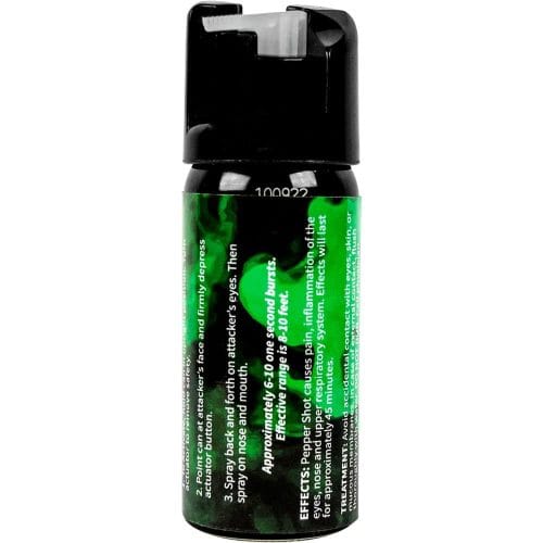 Pepper spray canister with green label and detailed usage instructions for personal safety and protection.
