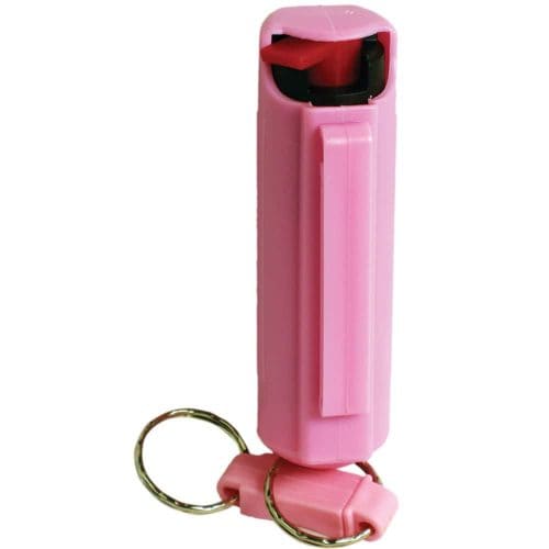Pink pepper spray canister with keychain attachment, ideal for personal safety and self-defense on the go.