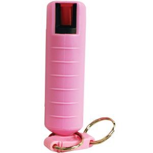 Pink pepper spray keychain for personal safety and security.