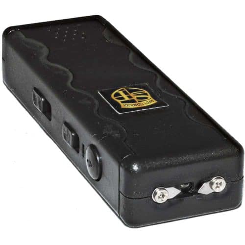 Black hand-held stun gun with visible electrodes, features buttons and a textured grip for personal safety.