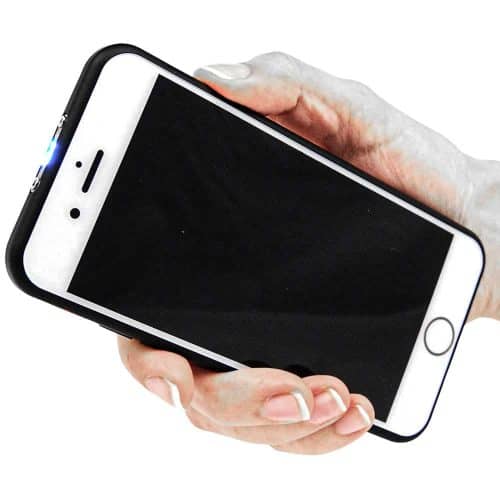 Hand holding smartphone with a black screen and protective case, isolated on white background.