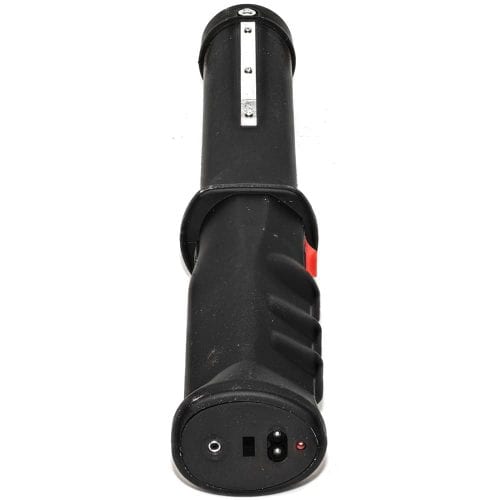 Black electric cattle prod with ergonomic handle and charging port, viewed from the handle side.